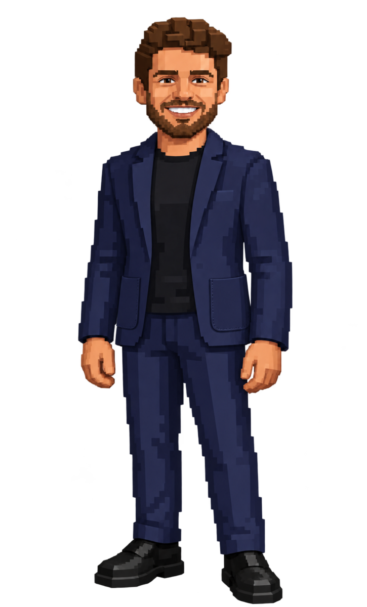A smiling voxel illustration of Aidan standing upright in a matching navy suit and black shoes, with both hands at his sides.
